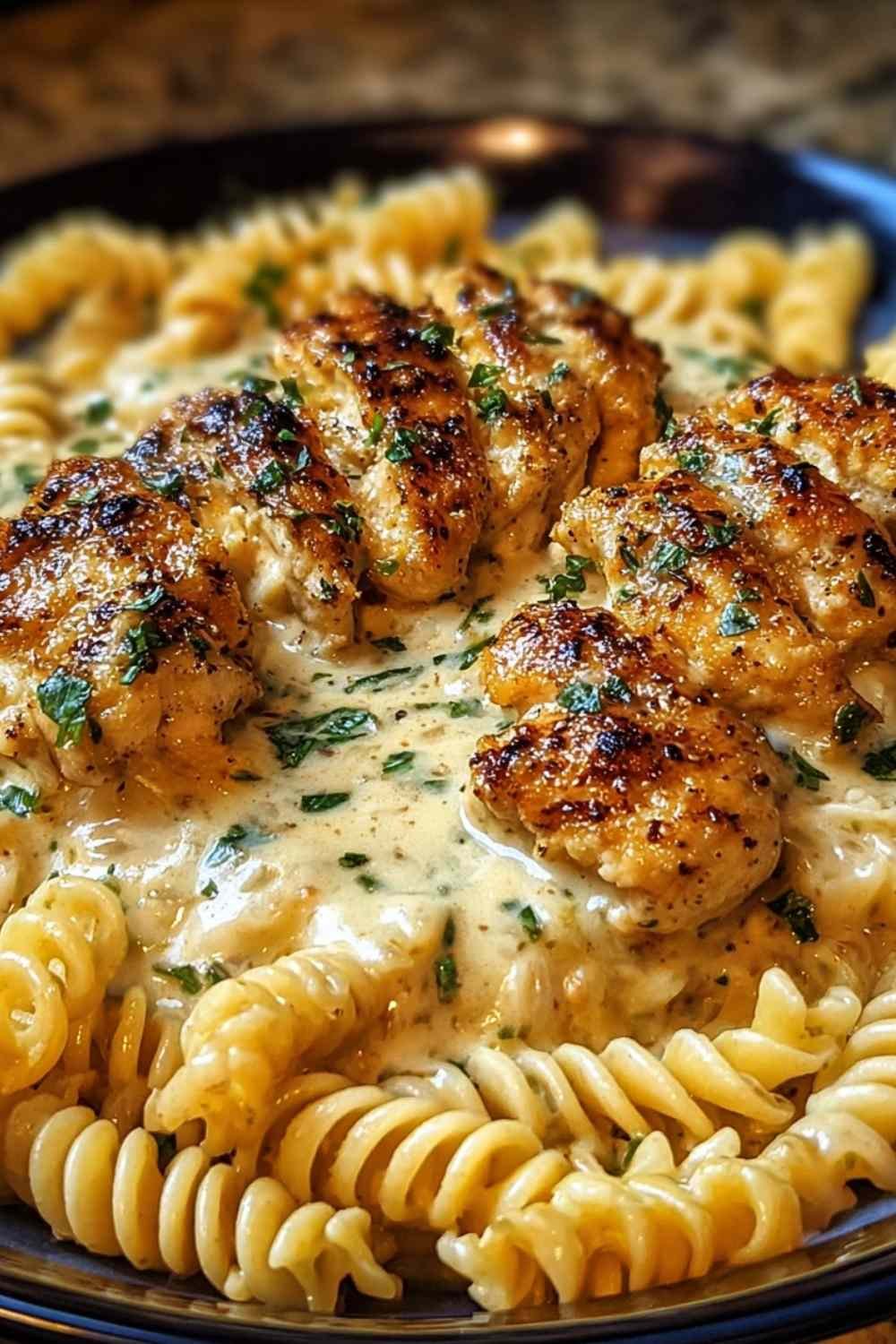 cheesy-garlic-chicken-twisted-pasta-velveeta-cream-sauce