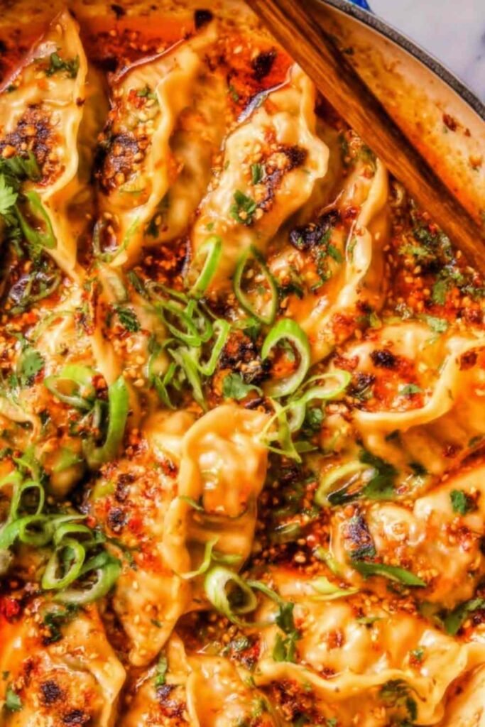 baked-chicken-dumplings-red-curry-sauce-pan