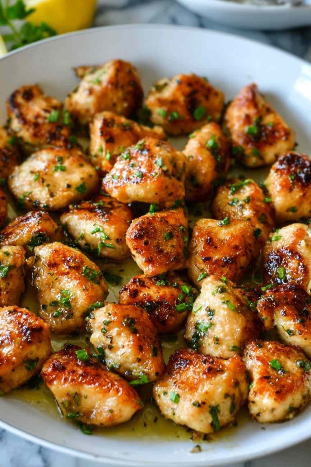 garlic-butter-chicken-bites-skillet-parsley