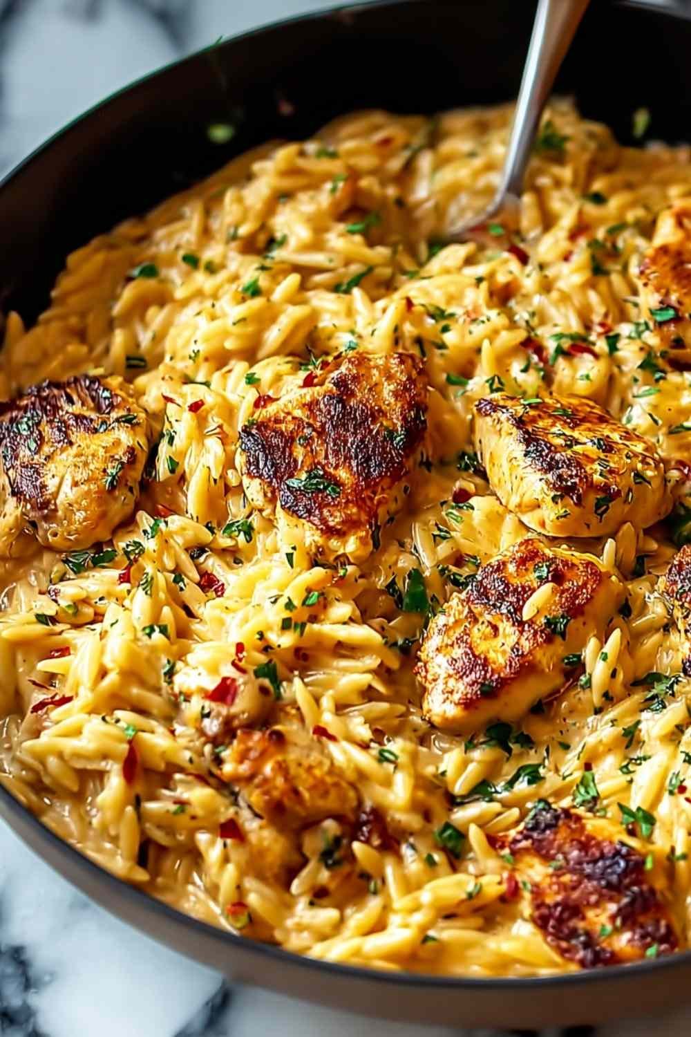 one-pot-cajun-chicken-alfredo-orzo-bowl-parsley