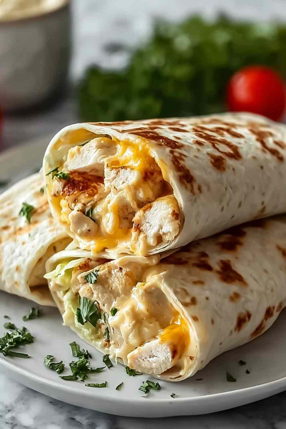 cheesy-garlic-chicken-wraps-sliced-plated