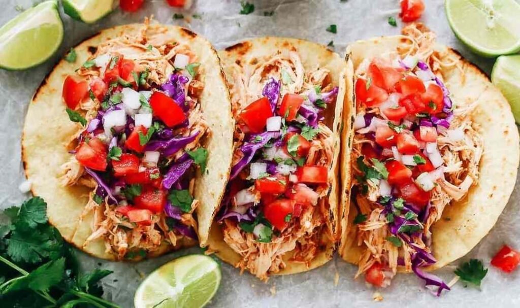 instant-pot-shredded-chicken-tacos-plated